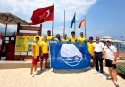NG PHASELIS BAY’DE MAVİ BAYRAK COŞKUSU: GÜVENLİ VE SÜRDÜRÜLEBİLİR GELECEK İÇİN YENİDEN GÖNDERDE!